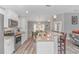 Charming kitchen open to dining area, featuring granite countertops and stainless appliances at 1930 W Homewood Rd., Conway, SC 29526