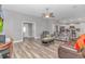 Cozy living room with a ceiling fan, and views of the kitchen and front door at 1930 W Homewood Rd., Conway, SC 29526