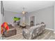 Cozy living room with wood floors, comfortable seating, and a TV, creating a relaxed atmosphere at 1930 W Homewood Rd., Conway, SC 29526