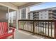 Private balcony featuring a chair and exterior view at 2001 Spring St. # G-2, North Myrtle Beach, SC 29582