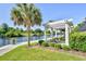 Beautiful riverfront with palm trees, manicured gardens, a pergola, and seating for residents to enjoy the view at 2180 Waterview Dr. # 727, North Myrtle Beach, SC 29582