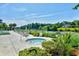 Relaxing hot tub by the waterway, surrounded by lush greenery, perfect for unwinding in Barefoot Resort at 2180 Waterview Dr. # 727, North Myrtle Beach, SC 29582