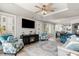 Bright living room with a fireplace, media center, and open access to the dining area at 2180 Waterview Dr. # 727, North Myrtle Beach, SC 29582