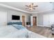 Spacious main bedroom featuring a large bed, dresser, and access to the ensuite bathroom at 2180 Waterview Dr. # 727, North Myrtle Beach, SC 29582