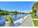 Scenic waterfront view along the waterway, featuring a path, lush landscaping and scenic views at Barefoot Resort at 2180 Waterview Dr. # 727, North Myrtle Beach, SC 29582