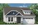 Charming single-Gathering home featuring a two-car garage and inviting front porch at 2208 Flatleaf Ct, Longs, SC 29568