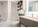 Bathroom featuring a tub-shower combo and modern vanity with open shelving for towels and toiletries at 2401 S Ocean Blvd. # 971, Myrtle Beach, SC 29577