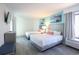 Inviting bedroom with two beds, ocean-themed wall art, and bright window at 2401 S Ocean Blvd. # 971, Myrtle Beach, SC 29577