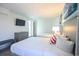 Comfortable bedroom with two beds, ocean-themed art, a dresser, and balcony access at 2401 S Ocean Blvd. # 971, Myrtle Beach, SC 29577