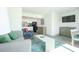 Comfortable living space featuring a sofa, kitchen access, a television, and a view into the dining area at 2401 S Ocean Blvd. # 971, Myrtle Beach, SC 29577