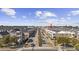 Aerial view of a neighborhood with townhomes, tree-lined streets, sidewalks, and street parking at 2794 Howard Ave. # D, Myrtle Beach, SC 29577