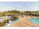 Enjoy the community pool with ample seating, umbrellas, and shaded areas for relaxation at 2794 Howard Ave. # D, Myrtle Beach, SC 29577
