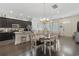 Bright dining area with hardwood floors, chandelier, and seamless flow into the kitchen at 2794 Howard Ave. # D, Myrtle Beach, SC 29577