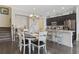 Dining area features hardwood floors, chandelier, and staircase to the next level at 2794 Howard Ave. # D, Myrtle Beach, SC 29577
