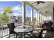 Spacious covered patio with outdoor seating area and a view of the community at 2794 Howard Ave. # D, Myrtle Beach, SC 29577
