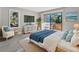 Bright bedroom with a sliding glass door leading to a balcony, plus coastal-inspired décor at 306 74Th Ave. N # 105, Myrtle Beach, SC 29572