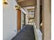 A cozy condominium entrance featuring a door and sliding glass door, leading to the interior of the residence at 306 74Th Ave. N # 105, Myrtle Beach, SC 29572