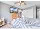 Bedroom featuring wood furniture, beach-themed art, and comfortable furnishings at 3308 S Ocean Blvd. # 2-A, North Myrtle Beach, SC 29582