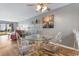 Open dining area with decorative table and chairs, connecting to the living room at 3308 S Ocean Blvd. # 2-A, North Myrtle Beach, SC 29582