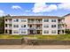 Charming condo building featuring multiple units with balconies, offering a relaxing outdoor space at 3308 S Ocean Blvd. # 2-A, North Myrtle Beach, SC 29582