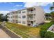 Condo building featuring grass, railings and a peek at the patios below at 3308 S Ocean Blvd. # 2-A, North Myrtle Beach, SC 29582
