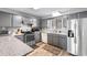 Well-lit kitchen with stainless steel appliances, plenty of counter space, and modern fixtures at 3308 S Ocean Blvd. # 2-A, North Myrtle Beach, SC 29582