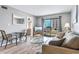 Inviting living room with patio access, comfortable seating, and stylish décor at 3308 S Ocean Blvd. # 2-A, North Myrtle Beach, SC 29582