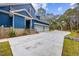 Long driveway leads to the three car garage of this beautiful blue home at 341 Brickwell Ln., Pawleys Island, SC 29585