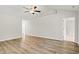 Spacious living room with wood floors, high ceilings, and neutral paint at 342 Barn Owl Way, Conway, SC 29527