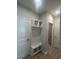 Organized mudroom with built-in shelving, a bench, and storage compartments, offering practical solutions for a tidy home entrance at 360 Kapalua Loop, Little River, SC 29566