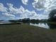 Beautiful pond view, providing a serene setting with mature trees around the edge at 360 Kapalua Loop, Little River, SC 29566