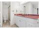 Bathroom featuring a red marble vanity top, vanity, toilet and glass enclosed shower space at 400 20Th Ave. N # 1101, Myrtle Beach, SC 29577