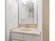 Bathroom featuring a sink with white vanity and a decorative mirror at 400 20Th Ave. N # 1101, Myrtle Beach, SC 29577