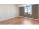 Bedroom with hardwood floors and a large window with an exterior view at 400 20Th Ave. N # 1101, Myrtle Beach, SC 29577
