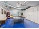 Game room with a ping pong table and hand-painted beach-scene wall art, and tiled flooring at 400 20Th Ave. N # 1101, Myrtle Beach, SC 29577