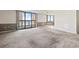 Bright living room with large sliding doors leading to a balcony and ocean views at 400 20Th Ave. N # 1101, Myrtle Beach, SC 29577