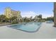 Outdoor pool with lounge chairs and views of the surrounding buildings and landscape at 400 20Th Ave. N # 1101, Myrtle Beach, SC 29577