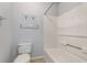 Cozy bathroom with standard toilet and shower/tub combo at 4247 Villas Dr. # 406, Little River, SC 29566