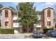 Inviting multi-story condo building with brick accents and a well-maintained landscaped exterior at 4247 Villas Dr. # 406, Little River, SC 29566