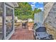 Landscaped backyard with brick pavers, a patio, and lush greenery at 4293 Parkway Ln. # 34, Little River, SC 29566