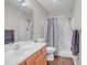 Well-lit bathroom showcasing a shower/tub combo, vanity with sink, and coordinated towel racks at 4293 Parkway Ln. # 34, Little River, SC 29566