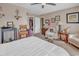 Comfortable bedroom featuring earth-tone walls with a ceiling fan and large furniture set at 4293 Parkway Ln. # 34, Little River, SC 29566