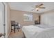 Comfortable bedroom with a ceiling fan, window, and ample closet space at 4293 Parkway Ln. # 34, Little River, SC 29566