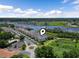 Aerial view of a condo community, waterway, marshland and landscaping on a sunny day at 4405 Eastport Blvd. # D-8, Little River, SC 29566
