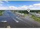 Wide angle aerial shot of condo community on the waterway with multiple boat docks at 4405 Eastport Blvd. # D-8, Little River, SC 29566