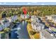 Scenic aerial view of condo community with a serene lake and well-maintained landscaping at 4861 Luster Leaf Circle # 204, Myrtle Beach, SC 29577