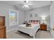 Bright and airy bedroom featuring a queen-size bed, cozy nightstands, and a serene window view with plenty of natural light at 4861 Luster Leaf Circle # 204, Myrtle Beach, SC 29577