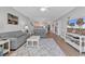 Inviting living room featuring neutral tones, hardwood floors, comfortable seating, and an open layout to the kitchen at 4861 Luster Leaf Circle # 204, Myrtle Beach, SC 29577