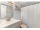 Bathroom with white vanity, brushed nickel faucet and tub with shower at 501 Maison Dr. # E20, Myrtle Beach, SC 29572