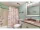 Bathroom featuring shower, bathtub, vanity, and decorative details at 501 Maison Dr. # E20, Myrtle Beach, SC 29572